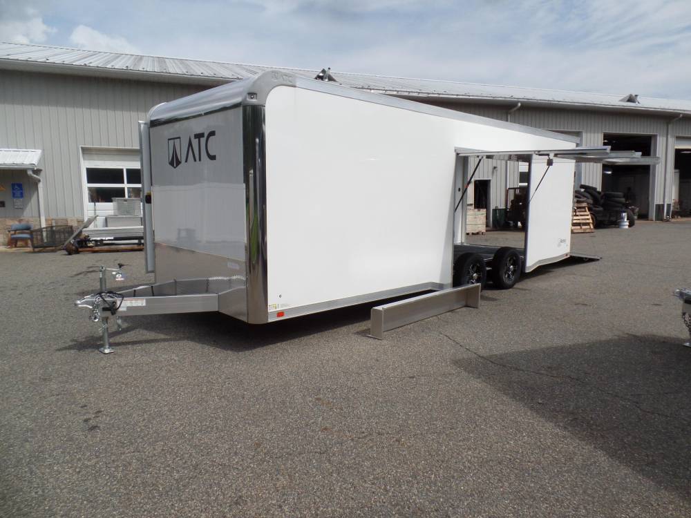 BEST Way to load a car in an enclosed trailer. Big Escape door with removable fender allows easy exit and entry to car inside the trailer. ATC all aluminum frame trailer.